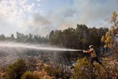 عکس های روز از مانور آمادگی در برابر حمله شیمیایی تا آتش سوزی های جنگلی chemicalbomb
